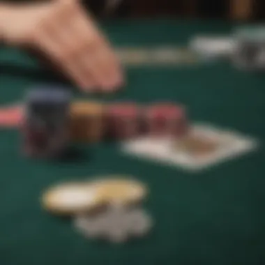 A close-up of poker chips and cards on a felt table